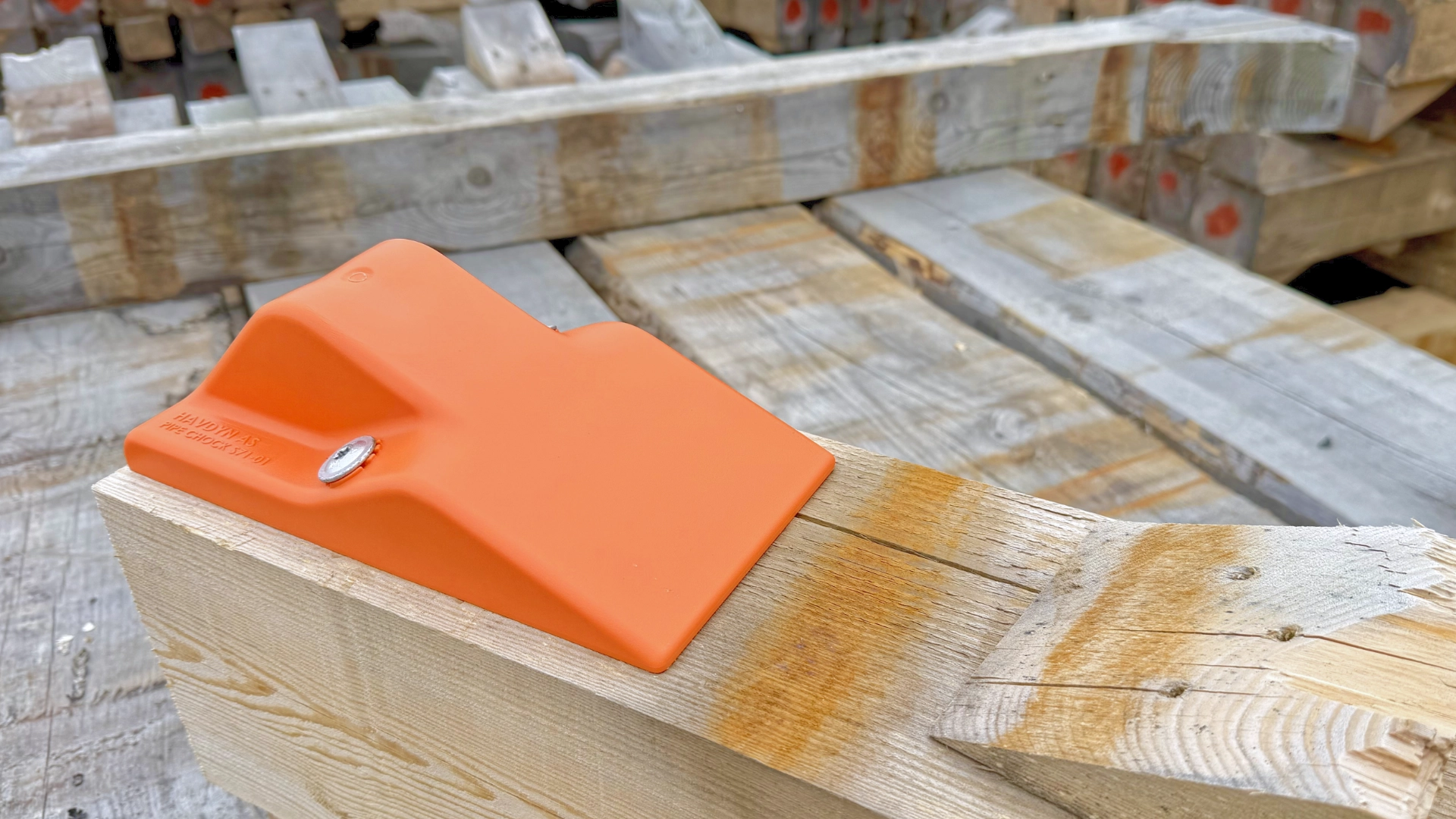 Pipe Chock S71 mounted on a wooden batten.